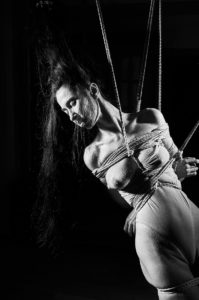 Beautiful woman tied up in traditional Japanese Bondage