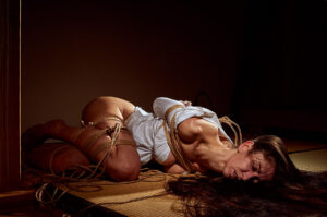 Woman tied to Hashira