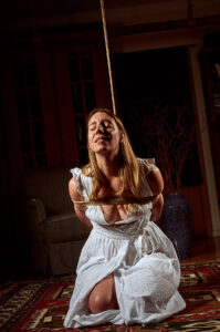 Pretty Woman in white dress tied up Shibari Kinbaku