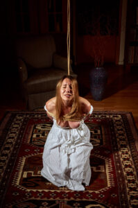 Pretty Woman in white dress tied up Shibari Kinbaku